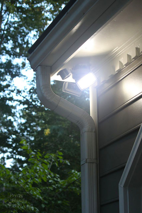 Electrician installing motion sensor light London